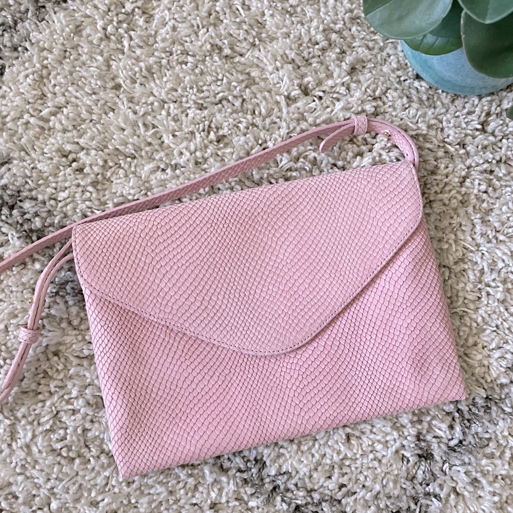 Light pink leather Barney’s clutch bag